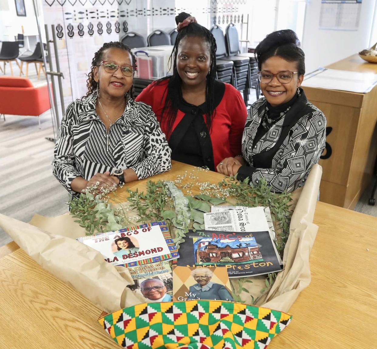 Sylvia Drummond-Parris, left, Loice Busingye and Késa Munroe-Anderson will be leading the project.  (Acadia University - image credit)