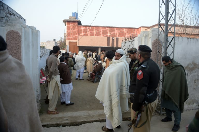 Pakistani residents gather to give condolences to Hamid Hussain, assistant professor of chemistry who was killed during a militant attack on Bacha Khan University