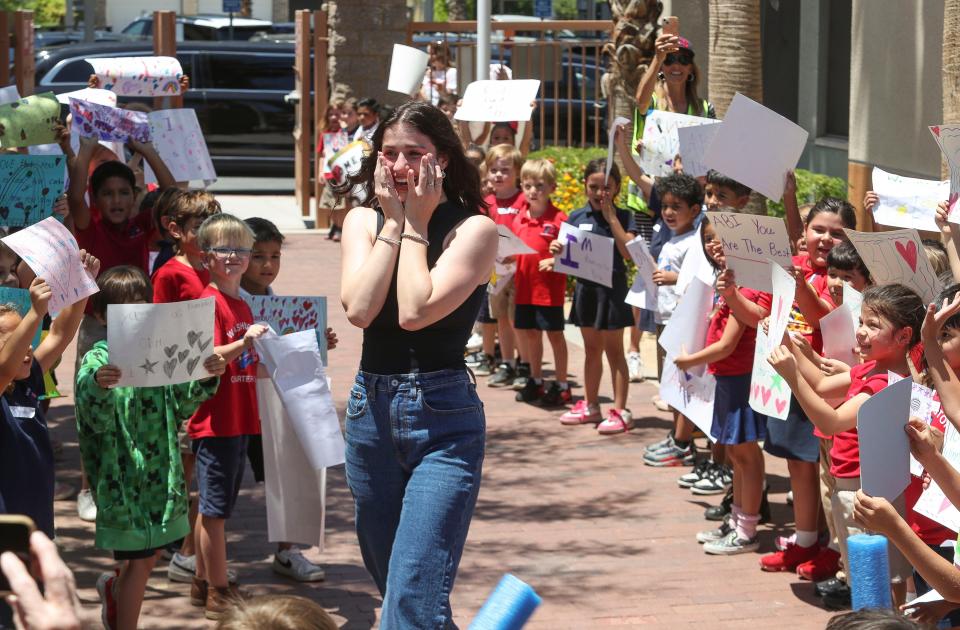 American Idol finalist and former student Abi Carter receives a boisterous welcome from the students at George Washington Charter School in Palm Desert, Calif., May 14, 2024.