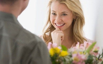 Brighten your partner's day with flowers - or a more unusual wedding anniversary gift - Getty Images Fee