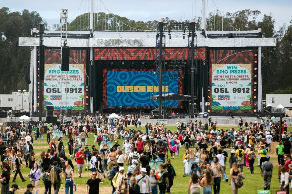 Fans walk around the Polo Field near Lands End stage during the first day of Outside Lands Music Festival at Golden Gate Park in San Francisco, Friday, Aug. 5, 2022. (Jessica Christian/San Francisco Chronicle via AP) ORG XMIT: CAFRA909