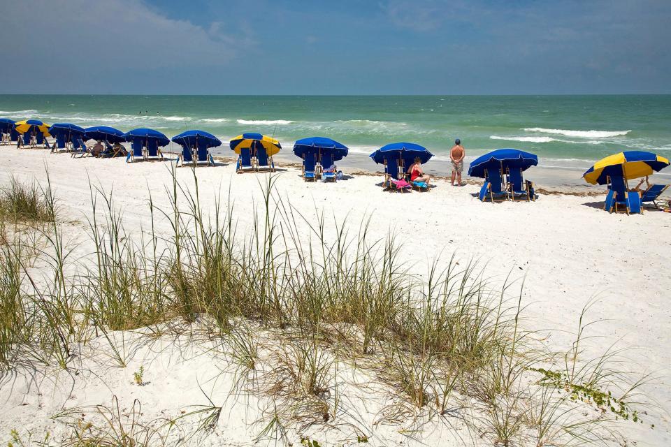 A May 21, 2008, file photo shows the main beach at Caladesi Island State Park, a barrier island along the Gulf of Mexico, on Florida's West Coast in Dunedin. Scientists say that half of the world's sandy beached are at risk of disappearing by the end of the century if climate change continues unchecked.