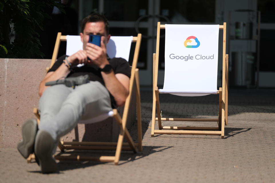 FRANKFURT AM MAIN, GERMANY - SEPTEMBER 11: A man sits at a Google Cloud exhibit during the press days at the 2019 IAA Frankfurt Auto Show on September 11, 2019 in Frankfurt am Main, Germany. The IAA will be open to the public from September 12 through 22. (Photo by Sean Gallup/Getty Images)