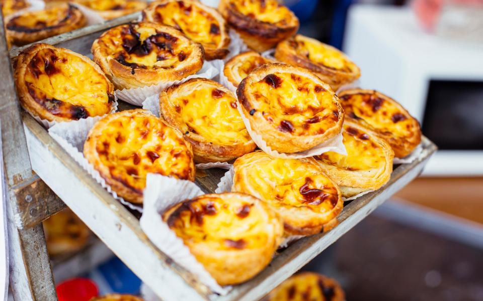 It is a criminal offence to leave Portugal without having tried a pastel de nata - Getty