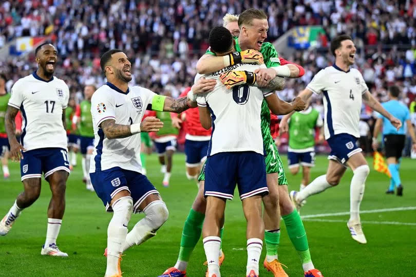 England's forward #17 Ivan Toney, England's defender #02 Kyle Walker, England's defender #08 Trent Alexander-Arnold, England's goalkeeper #01 Jordan Pickford and England's midfielder #04 Declan Rice celebrate after winning the UEFA Euro 2024 quarter-final football match between England and Switzerland at the Duesseldorf Arena in Duesseldorf on July 6, 2024.