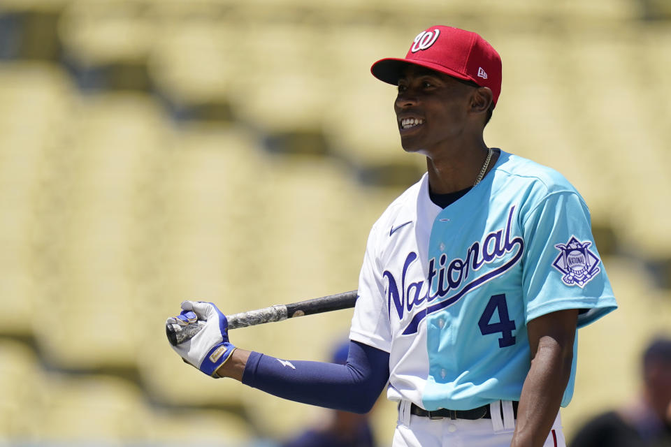 Darren Baker, of the Washington Nationals, warms up before the MLB All-Star Futures baseball game, Saturday, July 16, 2022, in Los Angeles. (AP Photo/Jae C. Hong)