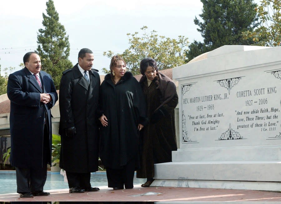 FILE – The children of the Rev. Martin Luther King Jr. and Coretta Scott King, from left, Martin Luther King, Jr. III, Dexter King, Yolanda King and Bernice King stand next to a new crypt dedicated to their parents in Atlanta, Monday Nov. 20, 2006. The King Center in Atlanta said Dexter, the 62-year-old son of the civil rights leader, died Monday, Jan. 22, 2024 at his California home after battling prostate cancer. (AP Photo/W.A. Harewood, File)