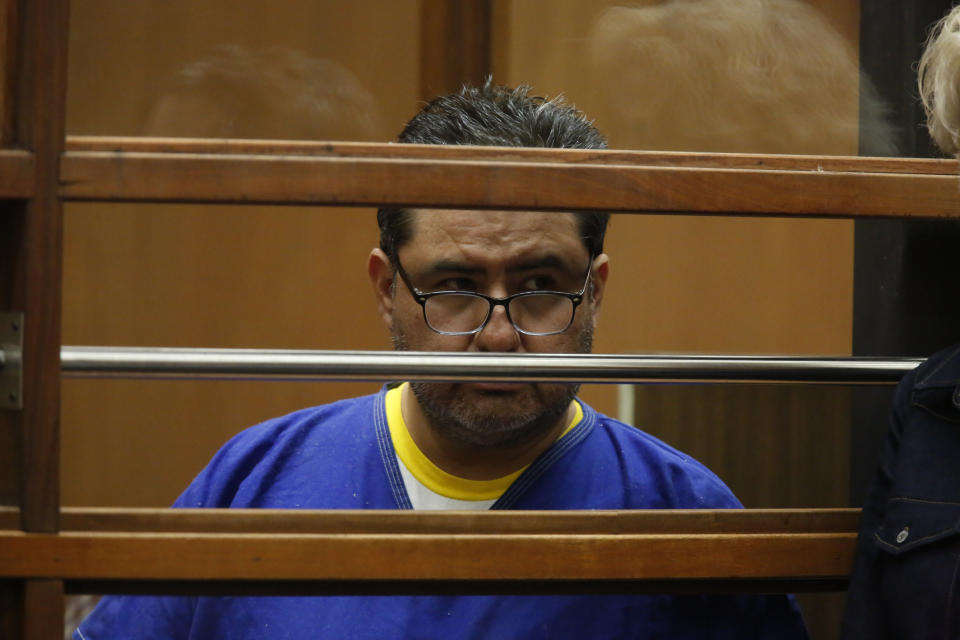 Naason Joaquin Garcia, appears in court in Los Angels, Calif. on Monday, June 10, 2019. García, and his co-defendants face a 26-count felony complaint that alleges crimes including child rape, statutory rape, molestation, human trafficking, child pornography and extortion. The charges detail allegations involving three girls and one woman between 2015 and 2018 in Los Angeles County. (Ringo Chiu/Pool Photo via AP)