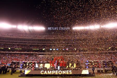 Jun 26, 2016; East Rutherford, NJ, USA; Chile celebrates after winning the championship match of the 2016 Copa America Centenario soccer tournament against Argentina at MetLife Stadium. Chile defeated Argentina 0-0 (4-2). Mandatory Credit: Brad Penner-USA TODAY Sports