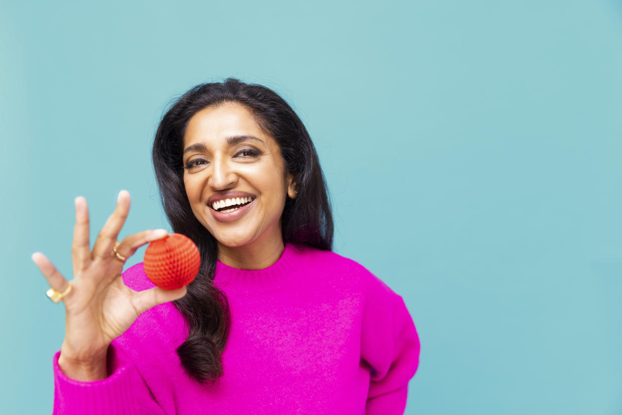 LONDON, UNITED KINGDOM - JANUARY 2023:   In this image released on February 1,2023,  Actress, Sindu Vee supports Red Nose Day 2023 by wearing the new Red Nose, which has been designed by Sir Jony Ive and is now available on Amazon, the new home of the Red Nose. Taken in London on the 18th January 2023. (Photo by Jake Turney/Comic Relief/Getty Images)