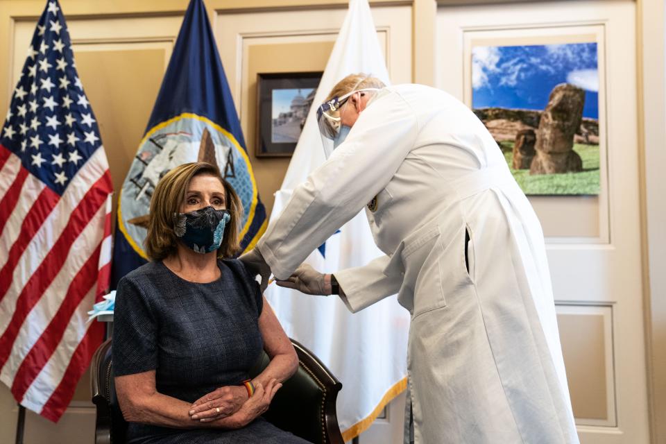 Brian Monahan, the Attending Physician of the United States Congress, administers the Pfizer-BioNTech COVID-19 vaccine to House Speaker Nancy Pelosi, D-Calif.,in the U.S. Capitol Building on Dec. 18, 2020 in Washington.