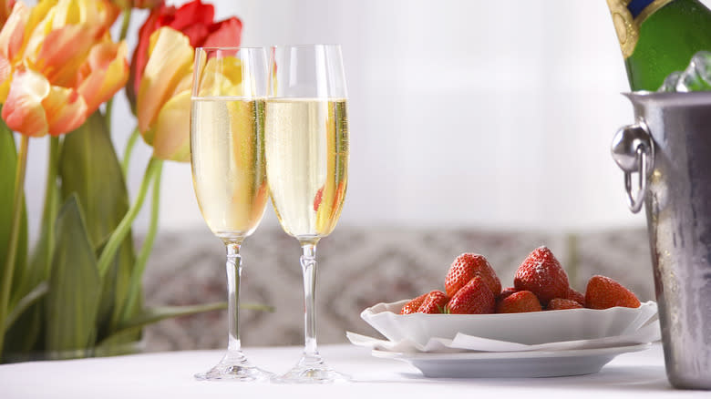 strawberry with champagne flutes