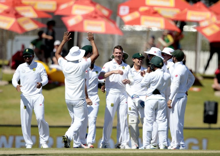 South Africa fast bowler Dale Steyn (C) celebrates the dismissal of New Zealand batsman Tom Latham on the fourth day of the second Test in Centurion, South Africa on August 30, 2016