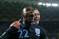 KIEV, UKRAINE - JUNE 15: Danny Welbeck of England celebrates scoring their third goal with Andy Carroll of England during the UEFA EURO 2012 group D match between Sweden and England at The Olympic Stadium on June 15, 2012 in Kiev, Ukraine. (Photo by Alex Livesey/Getty Images)