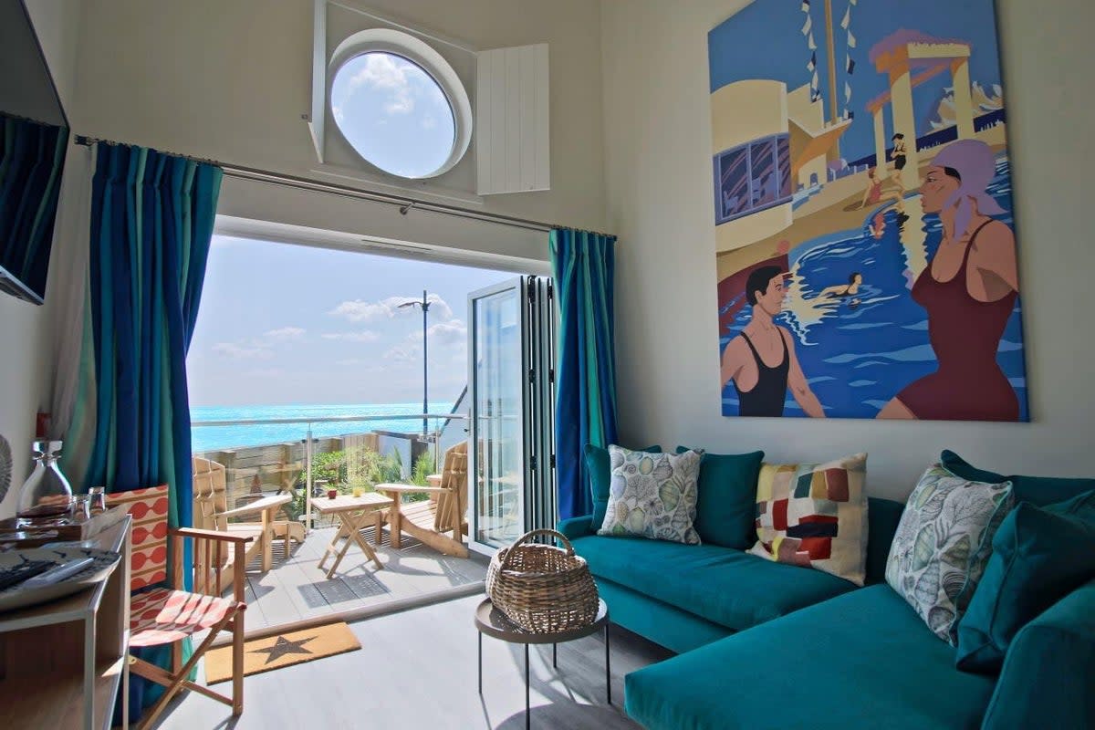 Beachcroft Beach Hut Suites look out onto pebbly Felpham Beach in West Sussex (Beachcroft)