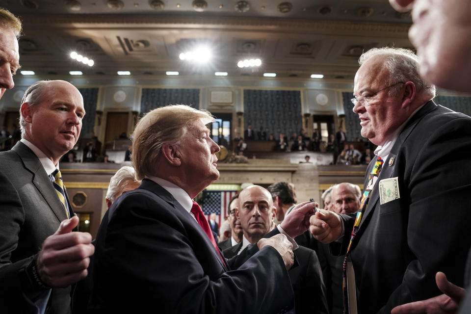 President Donald Trump takes with Rep. Billy Long, R-Mo., after giving his State of the Union address to a joint session of Congress, Tuesday, Feb. 5, 2019 at the Capitol in Washington. (Doug Mills/The New York Times via AP, Pool)