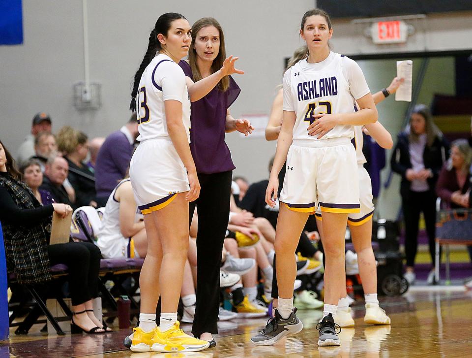 Ashland University women's basketball head coach Kari Pickens talks with Hayley Smith (33) and Annie Roshak against Grand Valley State during the NCAA Division II Midwest Regional Championship game Monday, March 13, 2023 at Kates Gymnasium.