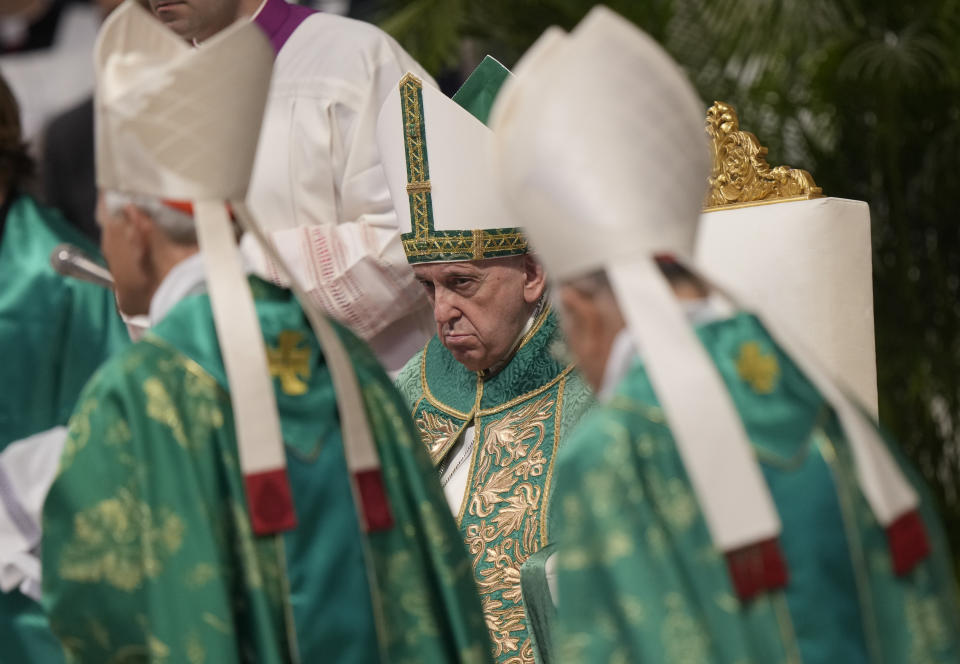 Pope Francis prepares to celebrate a mass for the newly elected cardinals in St. Peter's Basilica at The Vatican Tuesday, Aug. 30, 2022, concluding a two-day consistory on the Praedicate Evangelium (Preach the Gospel) apostolic constitution reforming the Roman Curia which was promulgated in March. Francis created 20 new cardinals on Saturday. (AP Photo/Andrew Medichini)