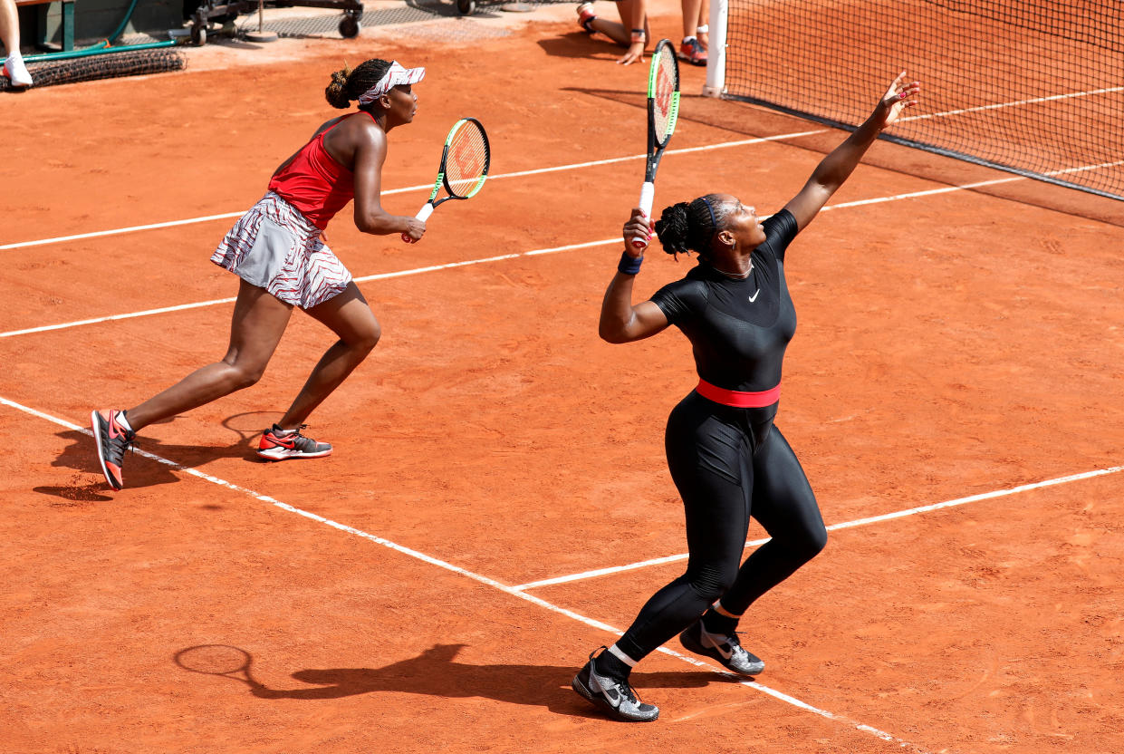 Tennis - French Open - Roland Garros, Paris, France - May 30, 2018    Serena Williams and Venus Williams of the U.S. during their first round match against Japan's Shuko Aoyama and Miyu Kato   REUTERS/Charles Platiau