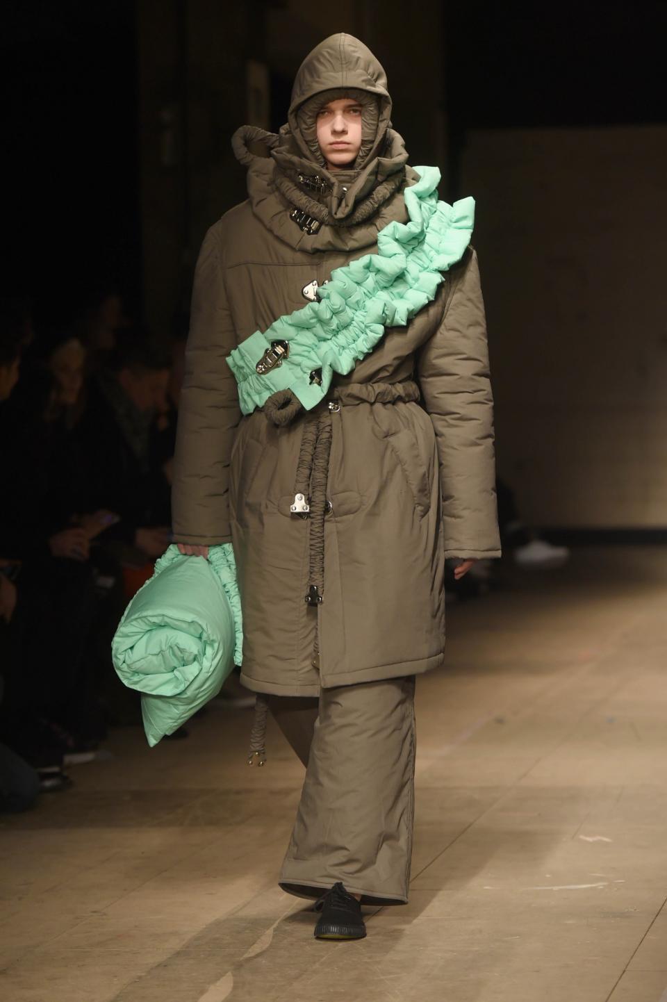 <p>Green's show also featured some very future forward outerwear. [Photo: Getty] </p>