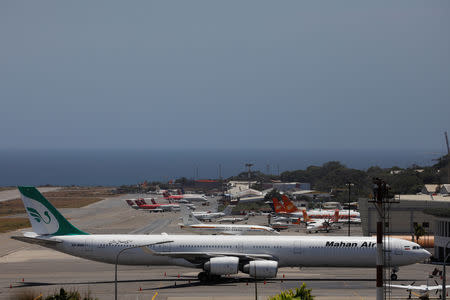 An Airbus A340 airplane of Mahan Air is seen at Simon Bolivar International Airport outside Caracas, Venezuela April 8, 2019. REUTERS/Carlos Garcia Rawlins