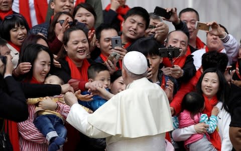 Pope Francis meets a group of faithful from China in April 2018  - Credit: AP Photo/Gregorio Borgia