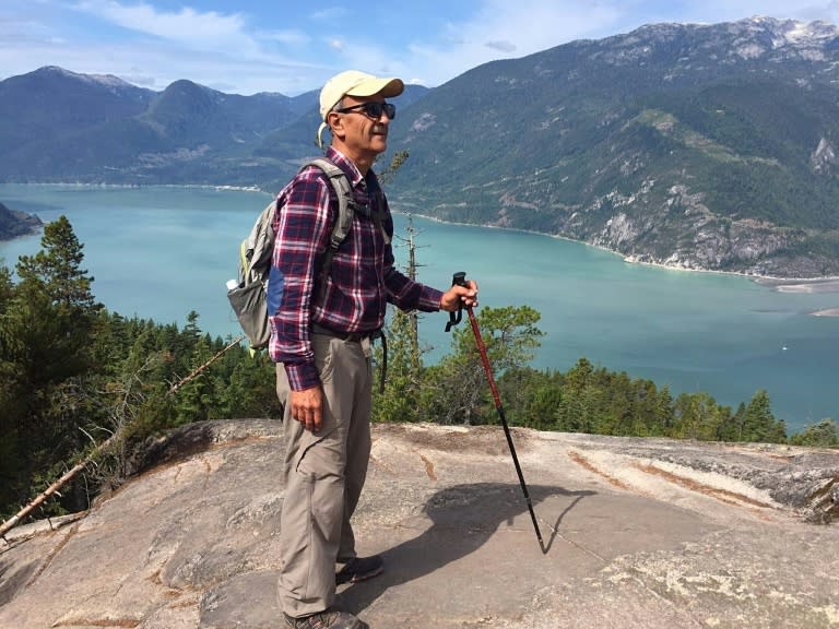 This handout photograph released on February 11, 2018 by the family of Iranian-Canadian environmentalist Kavous Seyed Emami shows him at an unidentified location