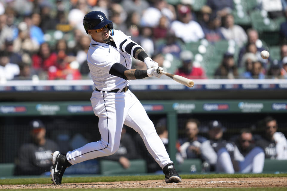 Detroit Tigers' Javier Baez singles against the Boston Red Sox in the third inning of a baseball game in Detroit, Sunday, April 9, 2023. (AP Photo/Paul Sancya)