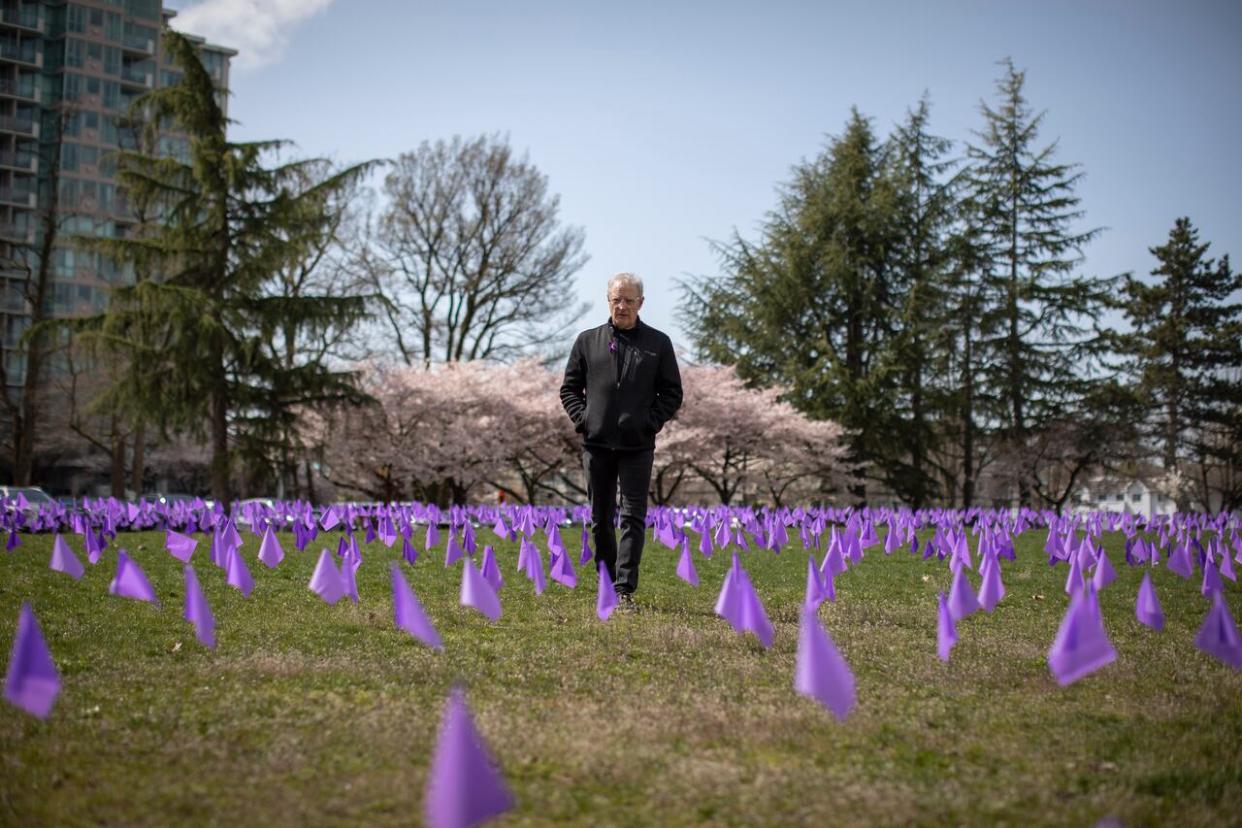 Flags represent lives lost to illicit, toxic drugs at a Moms Stop The Harm memorial in Vancouver in April 2023. (Ben Nelms/CBC - image credit)