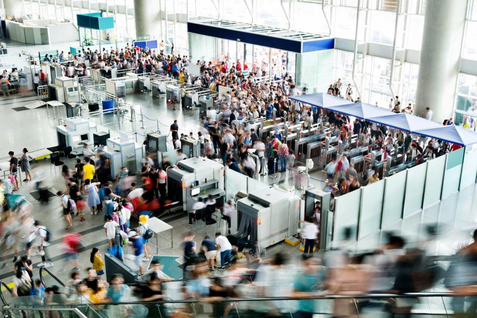 Crowd of people on railroad station lobby or airport