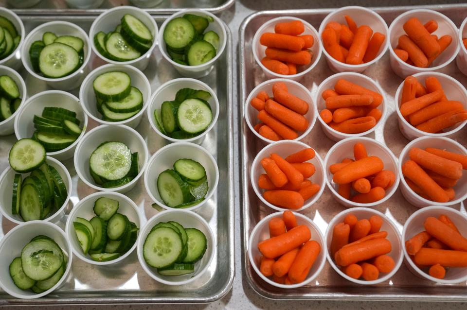 Fresh vegetables are served at lunchtime Wednesday, Dec. 6, 2023, at Circle City Prep in Indianapolis. Circle City Prep was the first of two schools to adopt Patachou Foundation's PataSchool program, which trains cafeteria staff to prepare foods from scratch and helps upgrade kitchen equipment, in order to provide free nutrient-dense meals to all students.