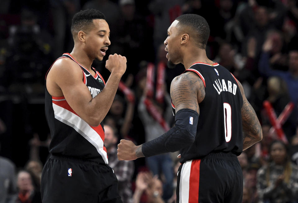 C.J. McCollum（圖左）與Damian Lillard。（AP Photo/Steve Dykes）