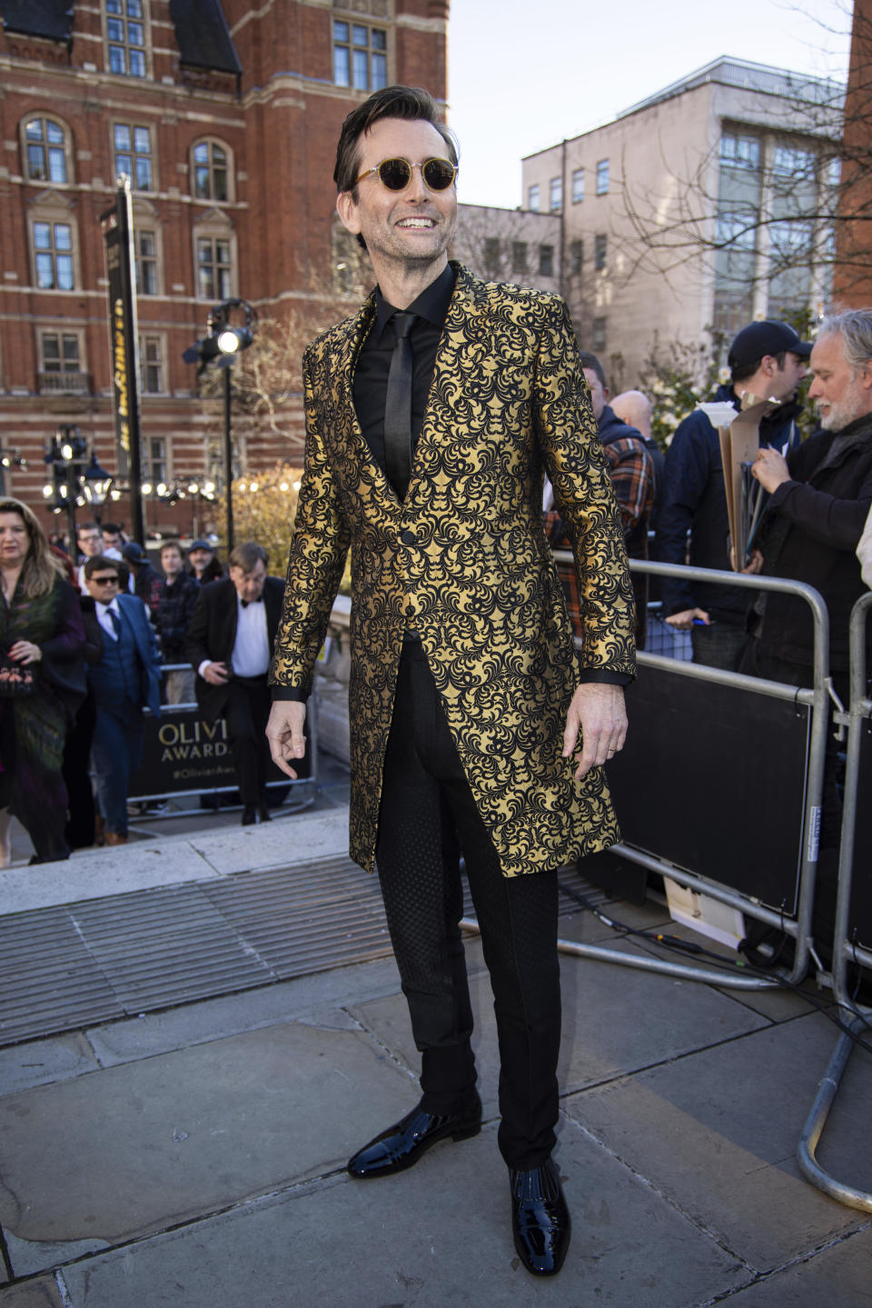 David Tennant poses for photographers upon arrival at the Olivier Awards in London, Sunday, April 2, 2023. (Photo by Vianney Le Caer/Invision/AP)
