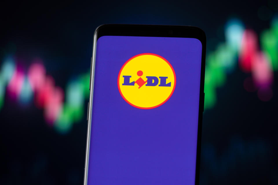 POLAND - 2020/11/04: In this photo illustration a Lidl logo seen displayed on a smartphone. (Photo Illustration by Mateusz Slodkowski/SOPA Images/LightRocket via Getty Images)