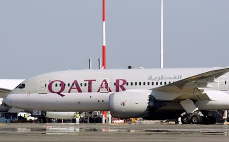 FILE PHOTO: A Qatar Airways Boeing 787 airplane is pictured at Leonardo da Vinci-Fiumicino Airport in Rome