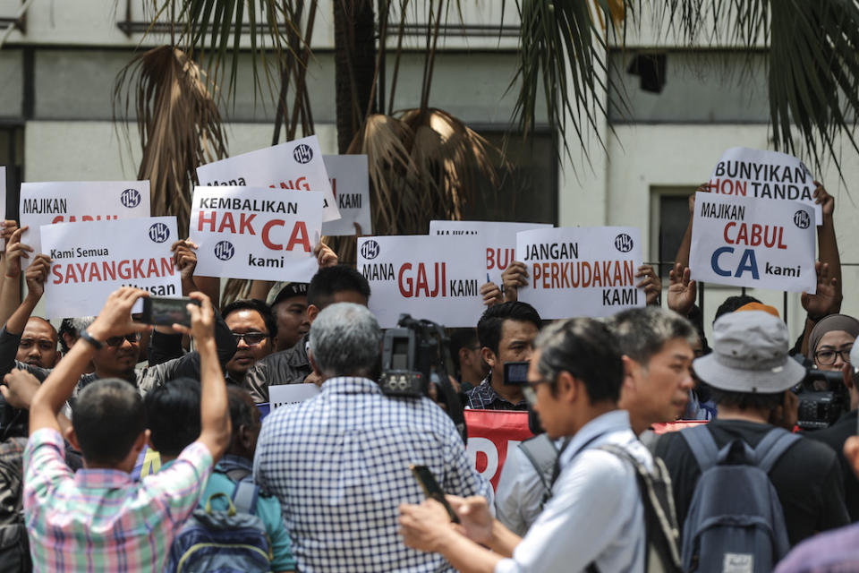 Utusan Malaysia workers protest over unpaid salaries in front of Utusan headquarters in Kuala Lumpur August 19, 2019. — Picture by Ahmad Zamzahuri