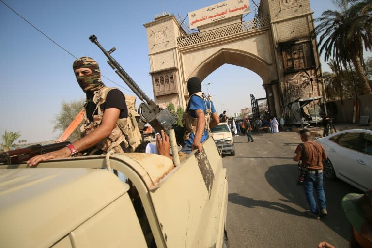 Iraqi special forces patrol in a street in Basra on September 8, 2018, after Iraq's Joint Operations Command vowed a "severe" response with "exceptional security measures", including a ban on protests and group travel