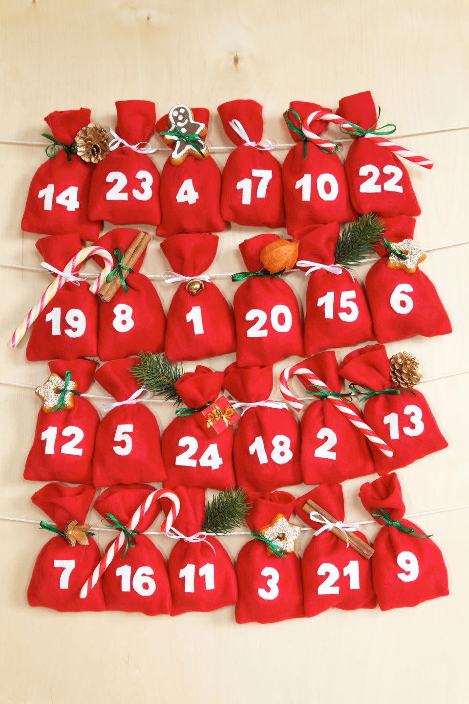 <p>Sure, you can buy an <a href="https://www.goodhousekeeping.com/holidays/christmas-ideas/g4911/christmas-advent-calendar/" rel="nofollow noopener" target="_blank" data-ylk="slk:advent calendar;elm:context_link;itc:0;sec:content-canvas" class="link ">advent calendar</a> based on your kids' favorite activities and watch with joy as they get a new goodie each day. But it's even more fun to make your own. "Each year we fill an advent calendar for my son with tiny toys, sweets and notes promising trips to his favorite bakery," says Jacquelyn Rodgers, Founder at Greentop Gifts. Try this: Fill <a href="https://go.redirectingat.com?id=74968X1596630&url=https%3A%2F%2Fwww.etsy.com%2Flisting%2F472572664%2F24-x-christmas-advent-calendar-tree&sref=https%3A%2F%2Fwww.goodhousekeeping.com%2Fholidays%2Fchristmas-ideas%2Fg23601545%2Fchristmas-traditions-kids-family%2F" rel="nofollow noopener" target="_blank" data-ylk="slk:24 advent calendar bags;elm:context_link;itc:0;sec:content-canvas" class="link ">24 advent calendar bags</a>, boxes or drawers with love notes, candy, small toys or ideas for good deeds they can do that day to spread good cheer. Or, keep special ornaments aside in a box and add a new one to the tree each morning! </p><p>RELATED: <strong><a href="https://www.goodhousekeeping.com/childrens-products/toy-reviews/g28939299/toy-advent-calendars-for-kids/" rel="nofollow noopener" target="_blank" data-ylk="slk:31 Best Toy Advent Calendars for Kids Counting Down the Days Until Christmas;elm:context_link;itc:0;sec:content-canvas" class="link ">31 Best Toy Advent Calendars for Kids Counting Down the Days Until Christmas</a></strong><i><br></i></p>