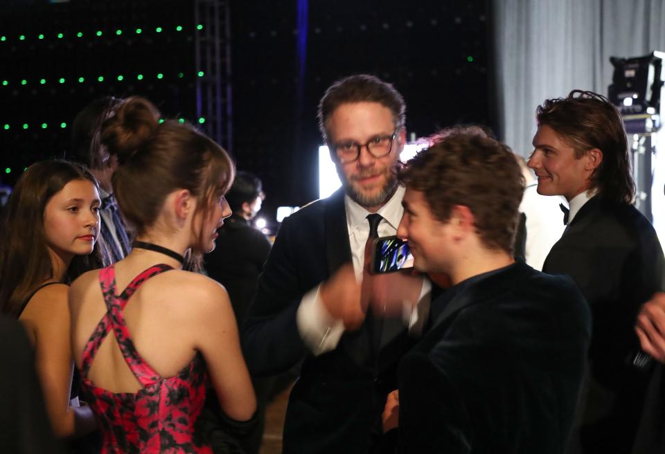 Seth Rogan and other cast members of the Fabelmans wait backstage at the Palm Springs International Film Festival awards gala in Palm Springs, Calif., Jan. 5, 2023.