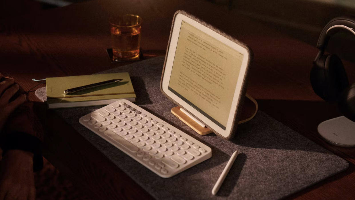  The Daylight DC-1 tablet sitting on a desk next to a keyboard. 