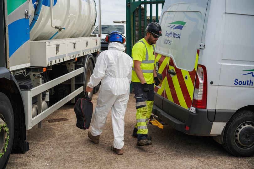 Workers at the South West Water Hillhead Reservoir site on May 18, 2024 in Brixham, England. -Credit:Hugh Hastings/Getty Images