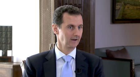 Syrian President Bashar al-Assad speaks during a TV interview in Damascus, Syria in this still image taken from a video on November 29, 2015. REUTERS/Reuters TV courtesy of Czech Television