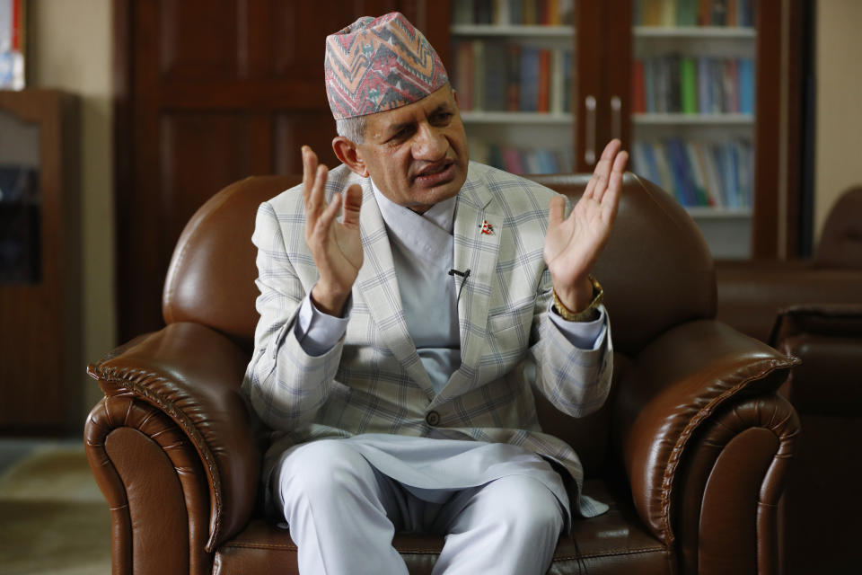 Nepal’s foreign minister Pradeep Gyawali gestures during an interview with the Associated Press in Kathmandu, Nepal, Tuesday, June 9, 2020. Gyawali said Tuesday that the country was still waiting for a response from India on holding talks to resolve a border dispute that has strained relations between the South Asian neighbors. (AP Photo/Niranjan Shrestha)