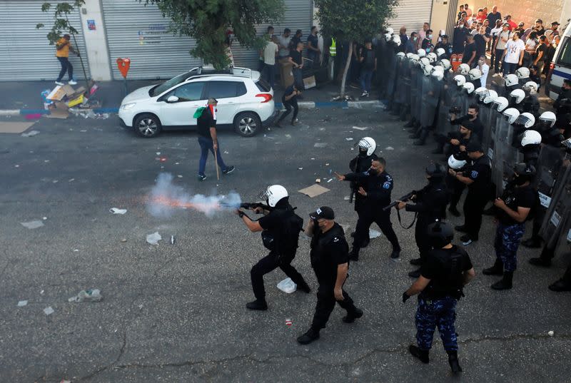 People protest over the death of Nizar Banat, in Ramallah