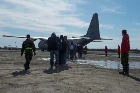 Canadian Armed Forces evacuates people from a wildfire in Pikangikum First Nation