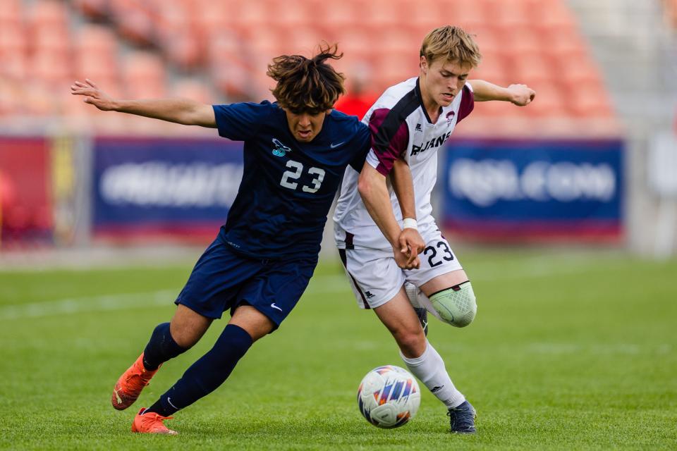 Juan Diego Catholic’s Denzel Gonzalez (23) battles Morgan’s Jett Beckstrom (23) during the 3A boys soccer championship game at America First Field in Sandy on May 12, 2023. | Ryan Sun, Deseret News