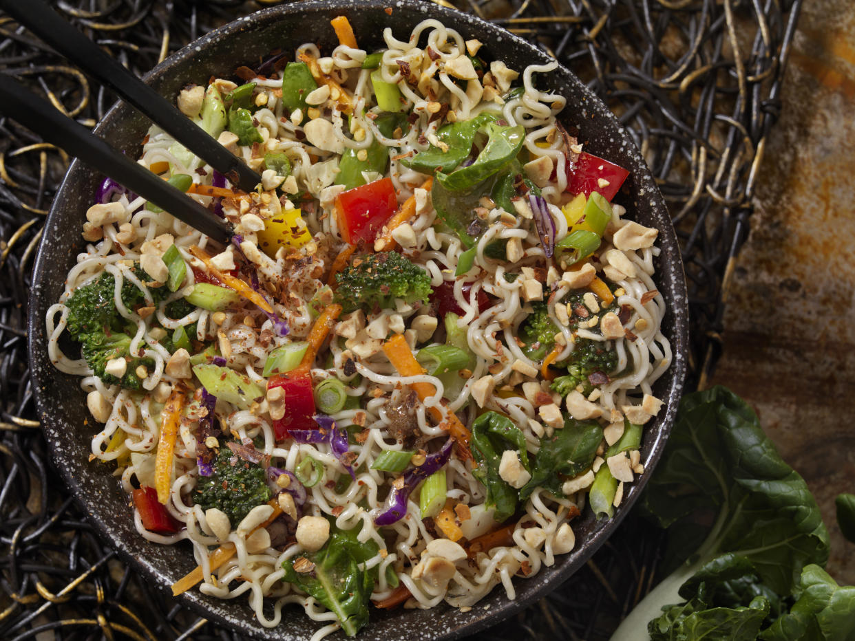 Fans of Ramen noodle salad say the crunchy meal can be whipped up in less than 10 minutes and enjoyed. (Photo: Getty Creative)