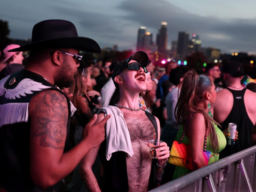 Fans enjoy the music and festivities during the LA's Pride in the Park Saturday.