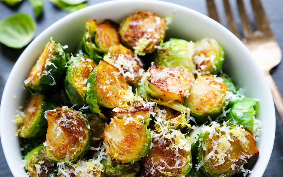 <p>Jon Ashton</p><p>You've never had Brussels sprouts as bright and flavorful as these.</p><p><strong>Get the recipe: <a href="https://parade.com/710201/jonashton/roasted-brussels-sprouts-with-lemon-and-parmesan/" rel="nofollow noopener" target="_blank" data-ylk="slk:Roasted Brussels Sprouts with Lemon and Parmesan;elm:context_link;itc:0;sec:content-canvas" class="link ">Roasted Brussels Sprouts with Lemon and Parmesan</a></strong></p>