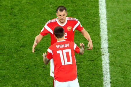 Soccer Football - World Cup - Group A - Russia vs Egypt - Saint Petersburg Stadium, Saint Petersburg, Russia - June 19, 2018 Russia's Fyodor Smolov comes on as a substitute to replace Artem Dzyuba REUTERS/Michael Dalder